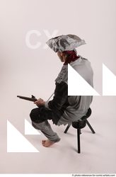 12 2019 01 JACK PIRATE SITTING POSE WITH GUN