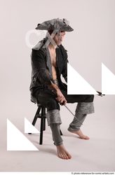 08 2019 01 JACK PIRATE SITTING POSE WITH GUN