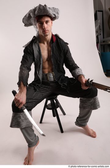 Man Adult Average White Fighting with gun Sitting poses Coat