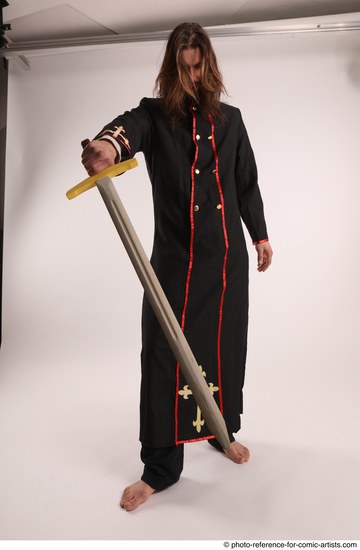 Man Adult Average White Fighting with sword Standing poses Coat