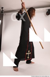 Man Adult Average White Fighting with spear Standing poses Coat