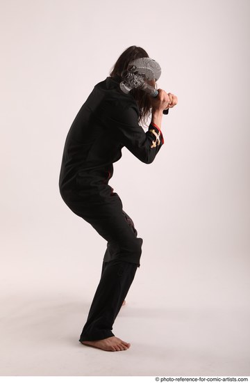 Man Adult Athletic White Fighting without gun Standing poses Coat