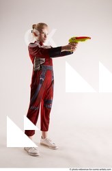 Woman Young Average White Fighting with gun Standing poses Army