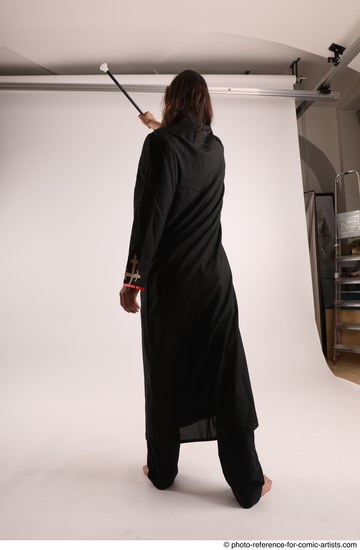 Man Adult Average White Magic Standing poses Coat