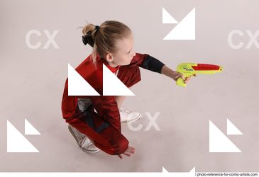 Woman Young Athletic White Fighting with gun Sitting poses Army