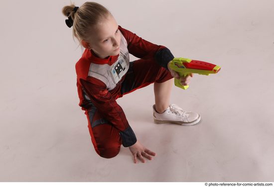 Woman Young Athletic White Fighting with gun Sitting poses Army