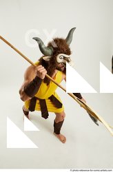 24 2019 01 SIMON HAHN STANDING POSE WITH SPEAR