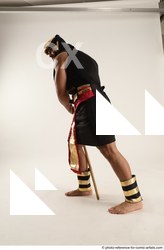 Man Adult Muscular Fighting with spear Standing poses Casual Latino