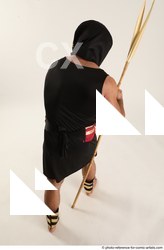 Man Adult Muscular Fighting with spear Standing poses Casual Latino