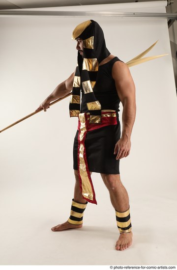 Man Adult Muscular Fighting with spear Standing poses Casual Latino
