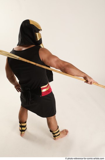 Man Adult Muscular Fighting with spear Standing poses Casual Latino