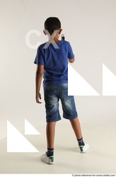 05 2020 01 TIMBO STANDING POSE WITH GUN