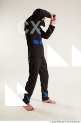 Man Young Athletic White Fighting with knife Standing poses Casual