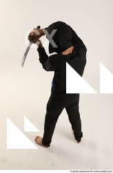 Man Young Athletic White Fighting with knife Standing poses Casual