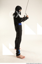 Man Young Athletic Fighting with sword Standing poses Casual Asian