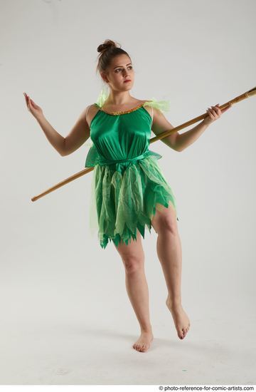 Woman Adult Average White Fighting with spear Standing poses Casual