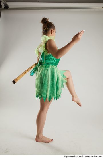 Woman Adult Average White Fighting with spear Standing poses Casual