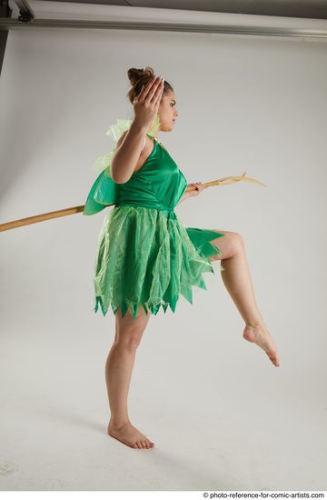 Woman Adult Average White Fighting with spear Standing poses Casual