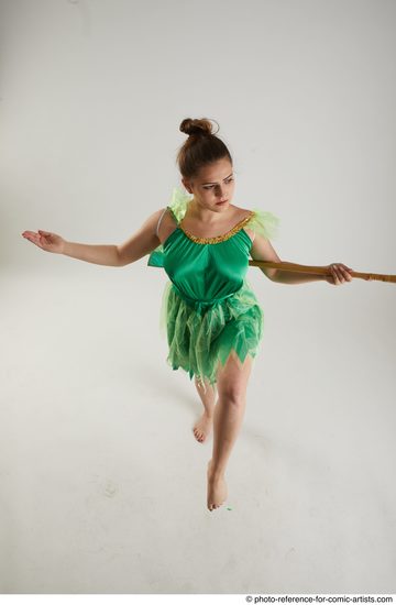 Woman Adult Average White Fighting with spear Standing poses Casual