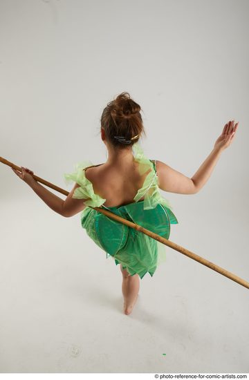 Woman Adult Average White Fighting with spear Standing poses Casual