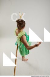 Woman Adult Average White Fighting with spear Standing poses Casual