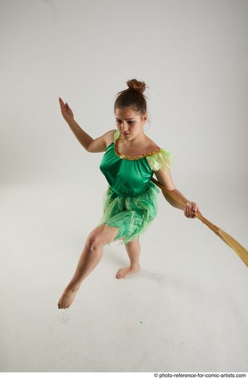 Woman Adult Average White Fighting with spear Standing poses Casual