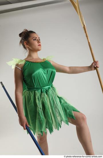 Woman Adult Average White Fighting with spear Standing poses Casual