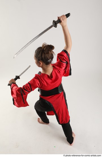 Woman Adult Average Fighting with sword Standing poses Coat Latino