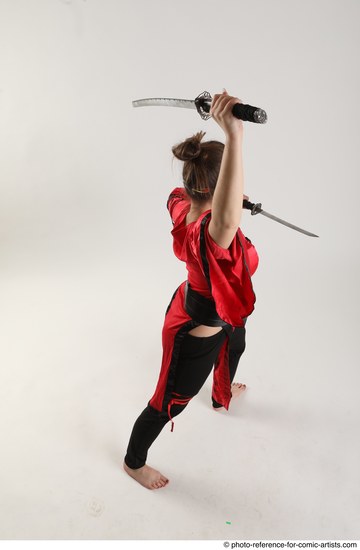 Woman Adult Average Fighting with sword Standing poses Coat Latino
