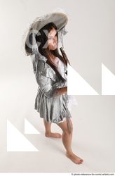 Woman Adult Average White Fighting with gun Standing poses Casual