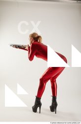 Woman Adult Athletic White Standing poses Casual Fighting with shotgun