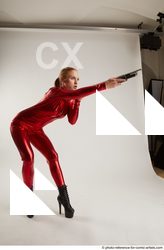 Woman Adult Athletic White Standing poses Casual Fighting with shotgun