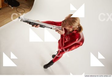 Woman Adult Athletic White Standing poses Casual Fighting with shotgun