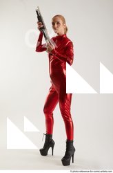Woman Adult Athletic White Standing poses Casual Fighting with shotgun