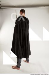 Man Adult Athletic White Fighting with sword Standing poses Coat