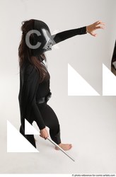 Woman Adult Average White Fighting with sword Standing poses Coat