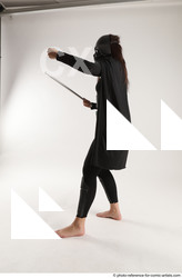 Woman Adult Average White Fighting with sword Standing poses Coat