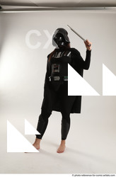 Woman Adult Average White Fighting with sword Standing poses Coat