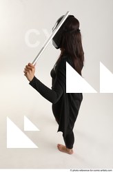 Woman Adult Average White Fighting with sword Standing poses Coat