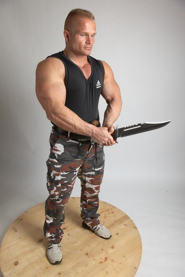 Man Adult Muscular White Fighting with sword Standing poses Casual