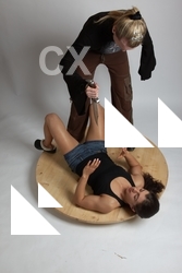 Adult Average Fist fight Laying poses Women