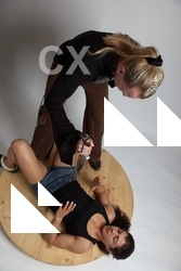 Adult Average Fist fight Laying poses Women