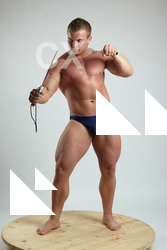 2021 ADAM WARD STANDING WITH TWO KNIVES (2)