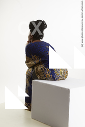 sitting african woman dina moses 04