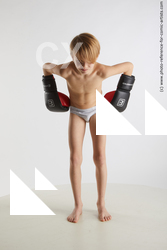 standing young boy with box gloves novel 01
