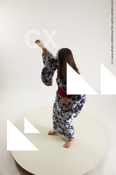 Woman Young Athletic Standing poses Asian Costumes