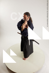 Man Adult Average White Fighting with sword Standing poses Costumes