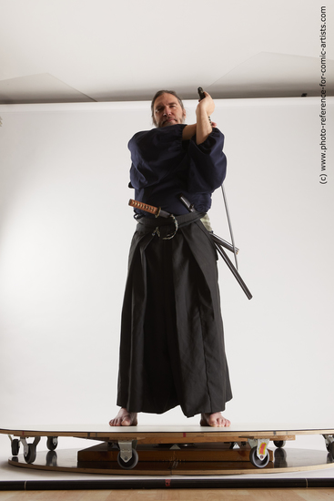 Man Adult Average White Fighting with sword Standing poses Costumes