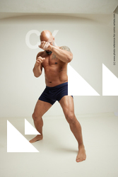 punching strong man ron 44