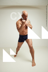 punching strong man ron 50